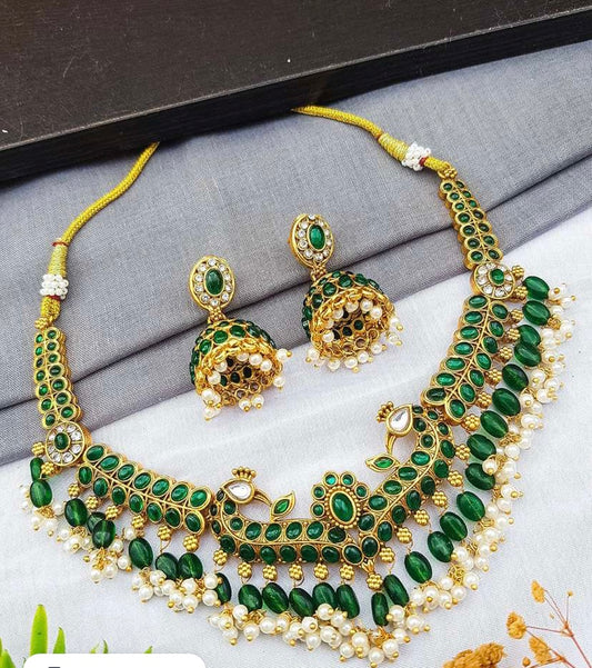 Stone studded green gold plated set